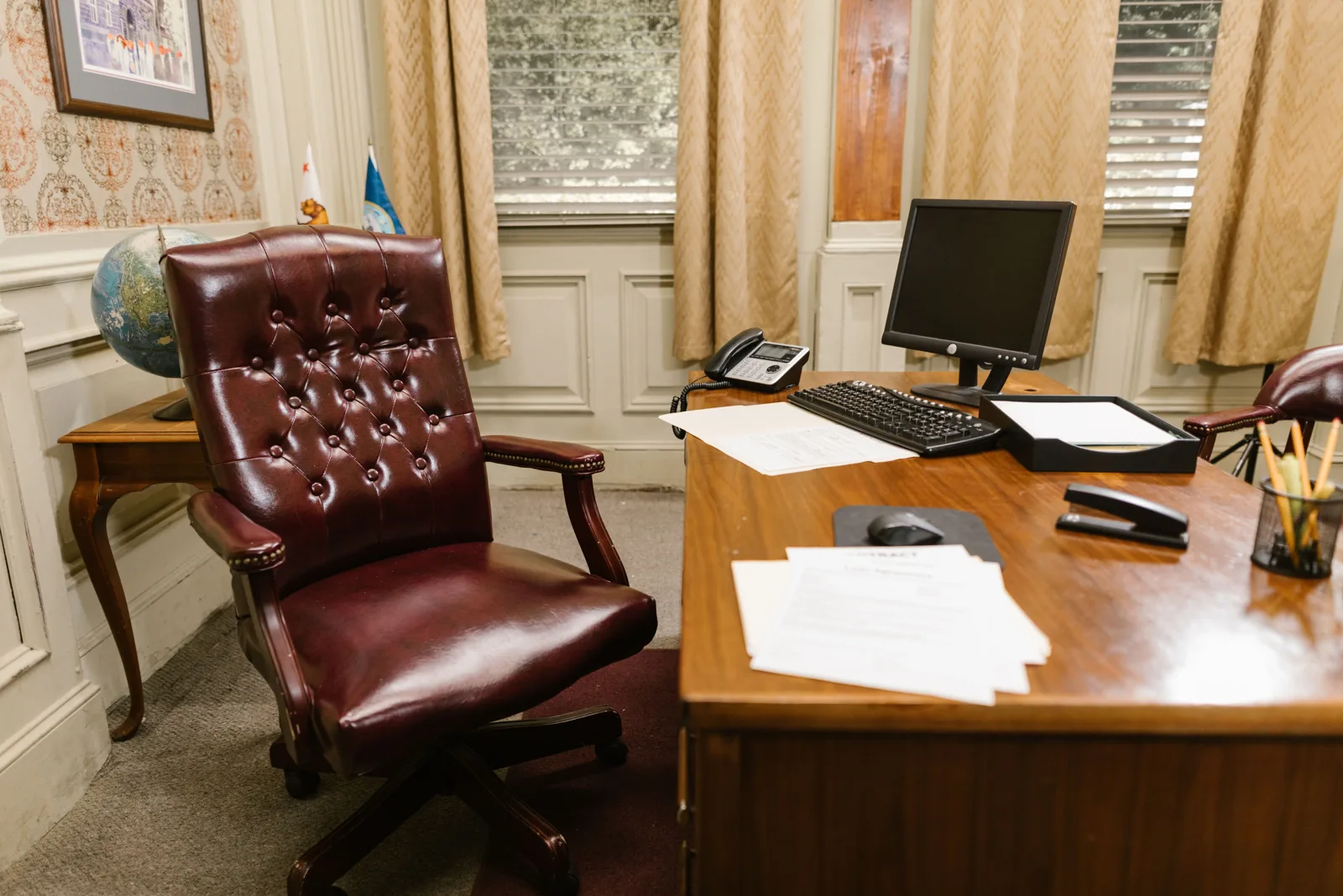 Traditional legal office with a timber desk and leather chair